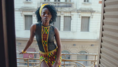 portrait of beautiful black female dancer on a balcony