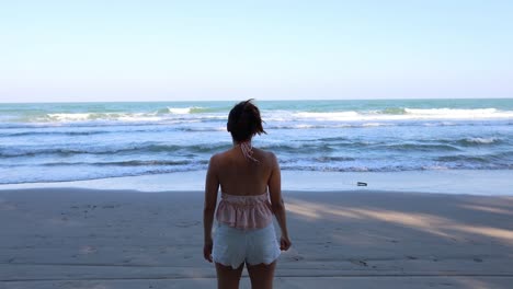 person enjoying and interacting with the ocean view