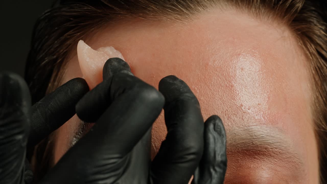 Halloween concept. Demon devil woman with red face and small horns on black background Ideas for halloween body art, make up artist.