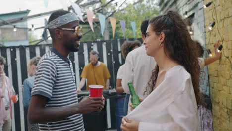 friends having fun at a backyard party