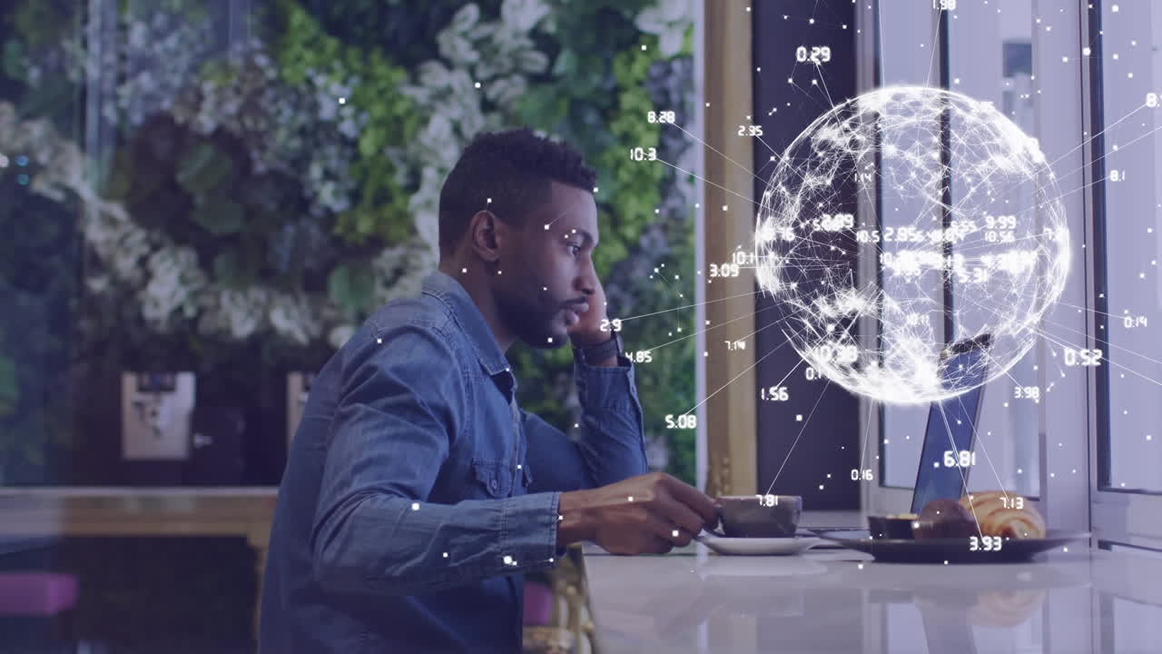 Globe of network of connections against man using laptop at cafe