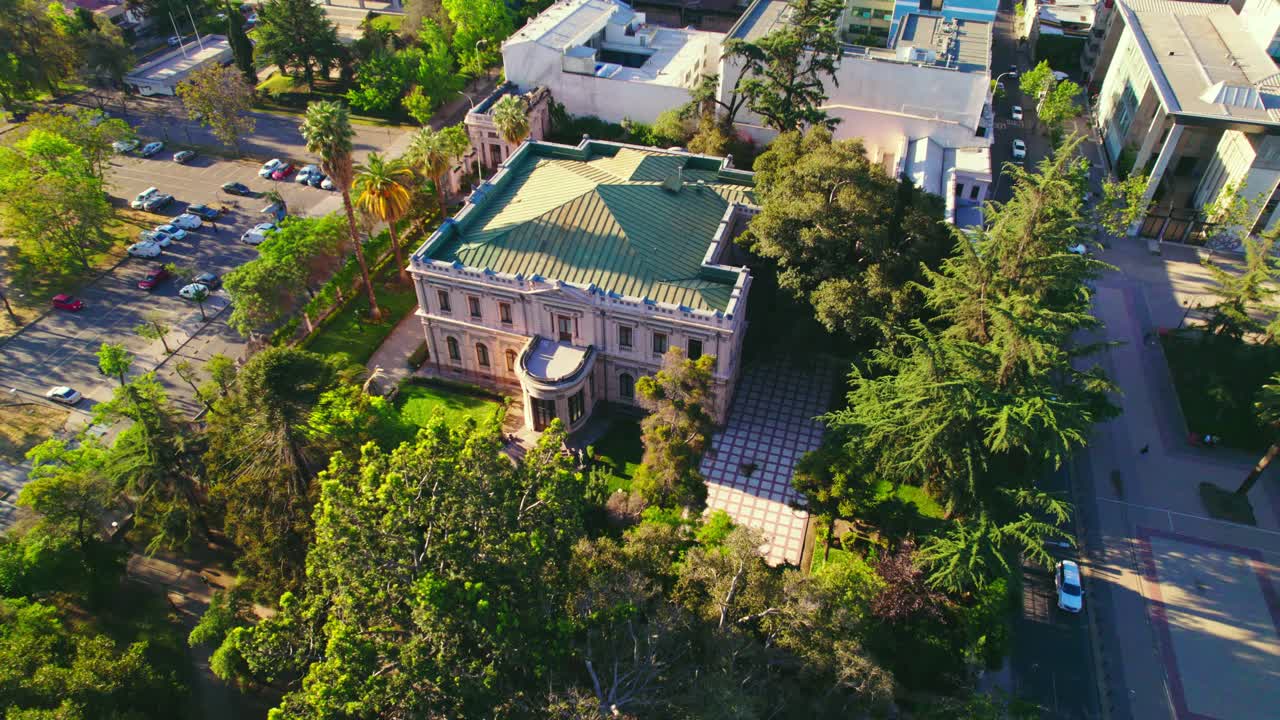 Cousi&ntilde;o Palace aerial view circling green rooftop and lush ornate heritage site gardens