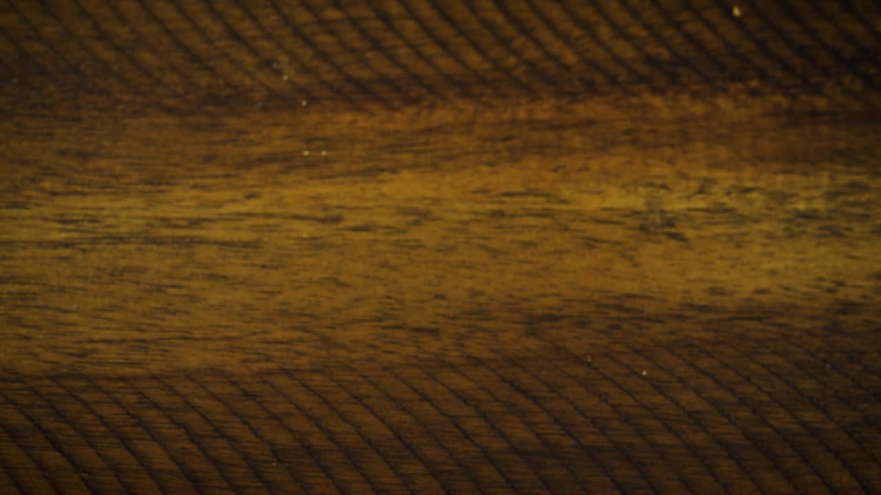 Close up of an apple pie moving in and out of frame