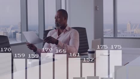 animation of data processing over african american businessman in office