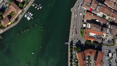 aerial overhead view of iseo marina harbour, italy