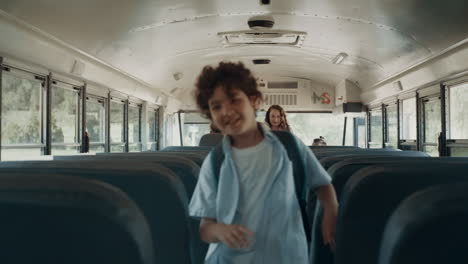 School-children-boarding-schoolbus.-Diverse-students-getting-in-academic-shuttle