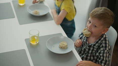 kids eating dumplings