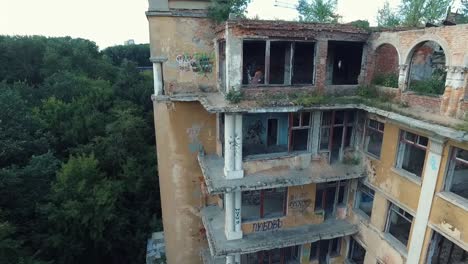 aerial view of a decaying multi-story building