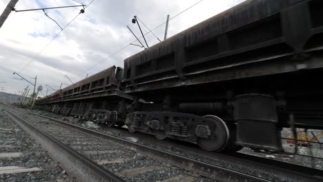 moving freight train on railroad tracks