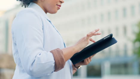 city, tablet and hands of business woman typing