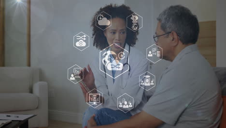 healthcare professional discussing digital data with patient, surrounded by animation icons