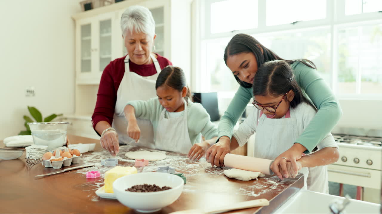 Grandmother, mom and girls in a kitchen