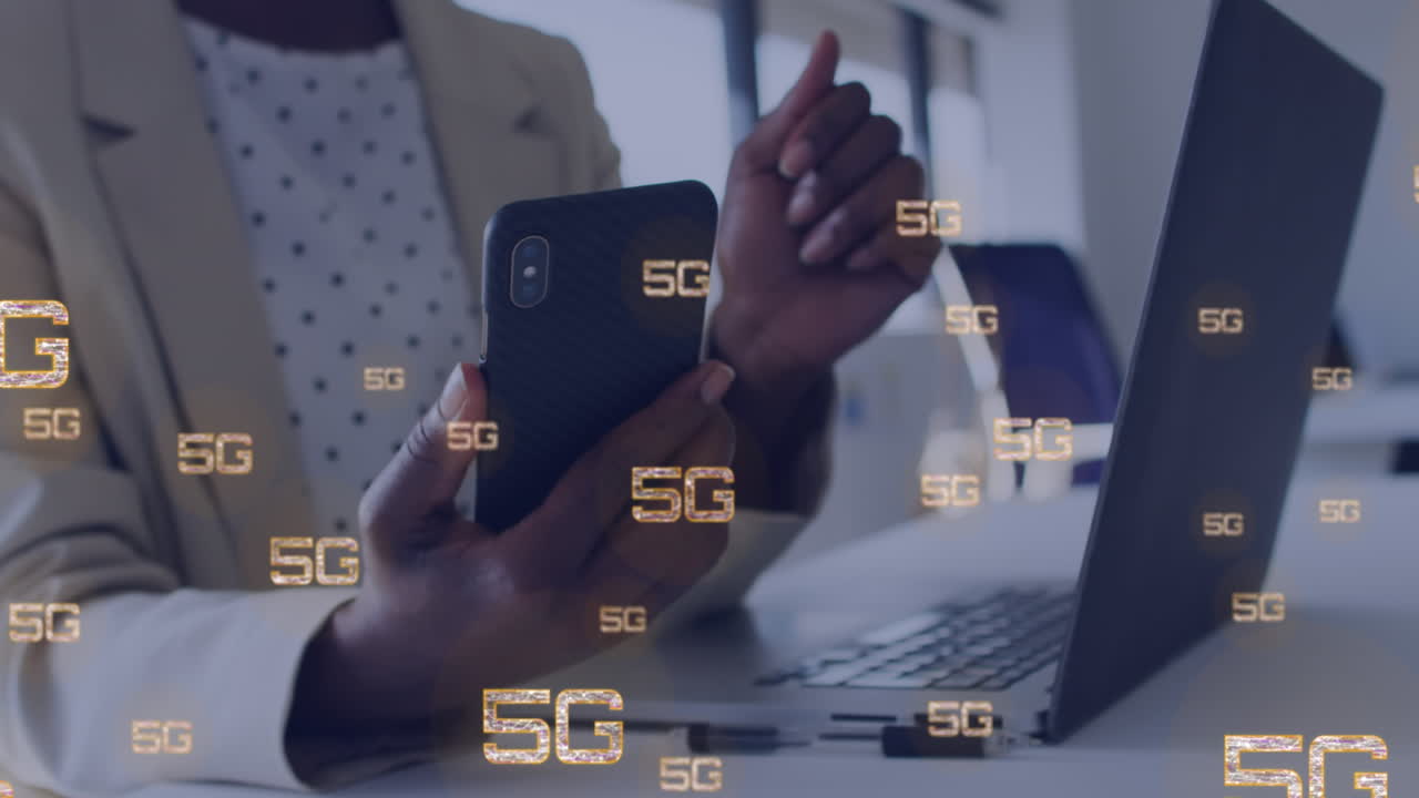 Animation of 5g text over african american businesswoman using smartphone
