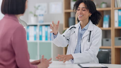 Doctor,-woman-and-handshake-in-office