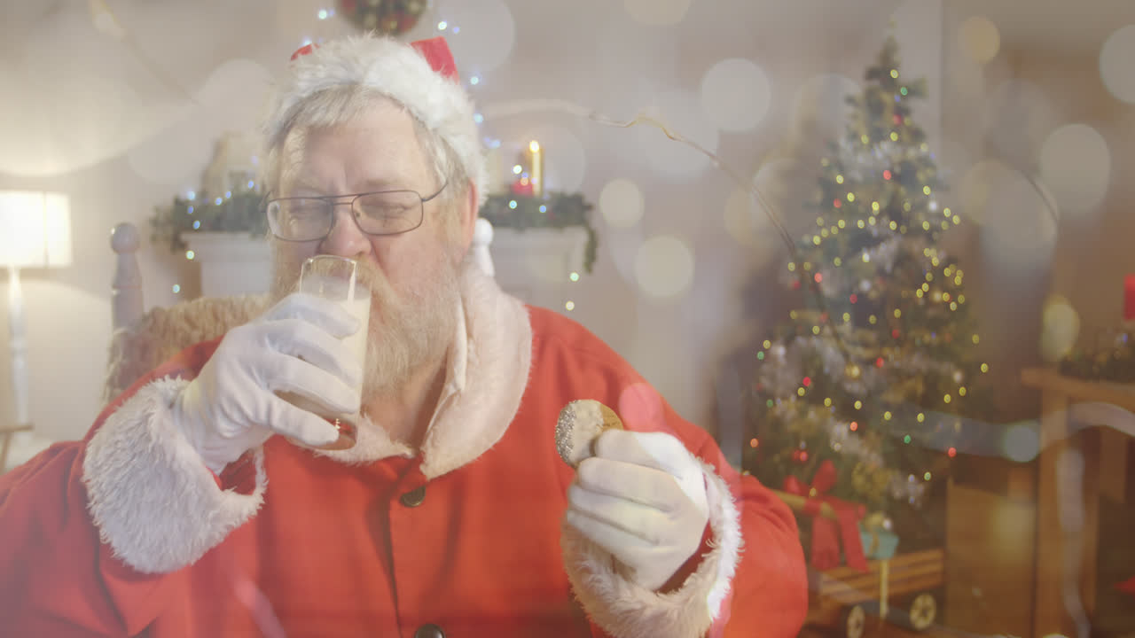 산타가 크리스마스에서 우유를 마시는 빛의 반점 애니메이션