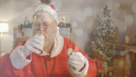 animación de puntos de luz sobre santa bebiendo leche en navidad