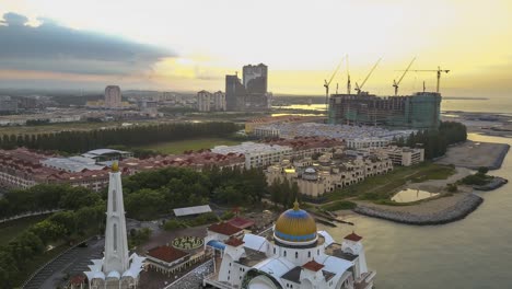 beautiful sunrise at melaka straits floating mosque