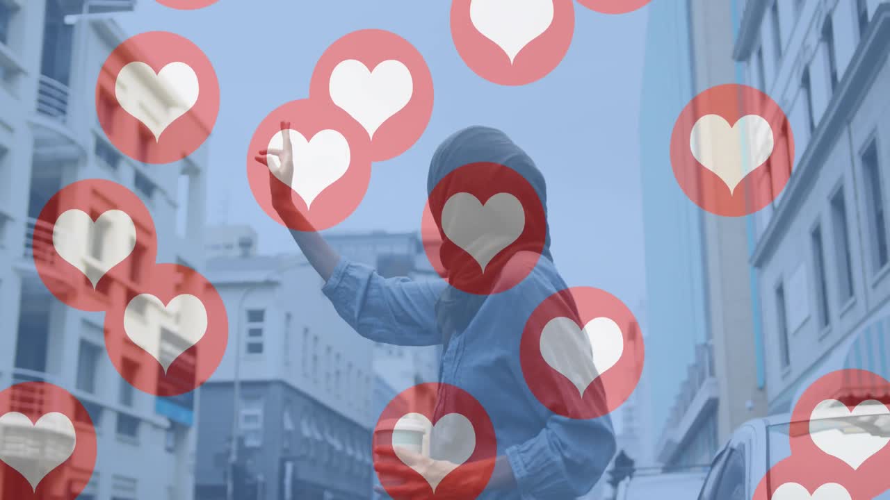 히자브를 입은 여성이 도시 거리에서 택시를 호출하는 사랑의 심장 아이콘의 애니메이션