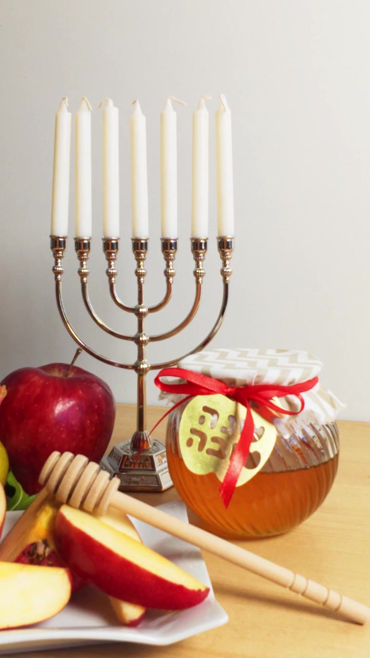 Traditional rosh hashanah celebration with honey and apple