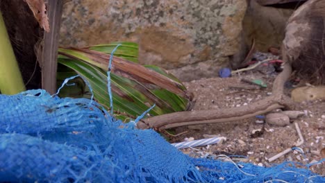 Plastic-bag-close-up-straw-and-small-rubbish-background-4K-Asia,-Thailand-Filmed-with-Sony-AX700