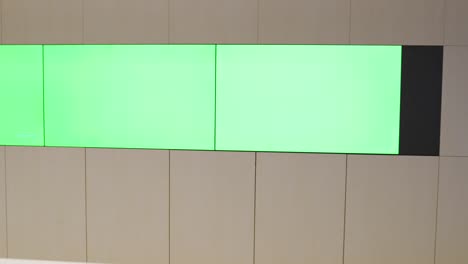 empty office, desk, and chairs at a main cctv security data center with green screen and chroma key