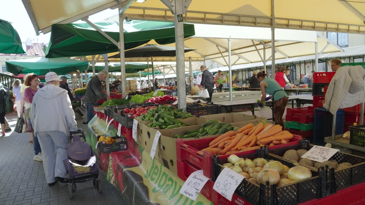 Busy Farmers Market Scene with Fresh Produce