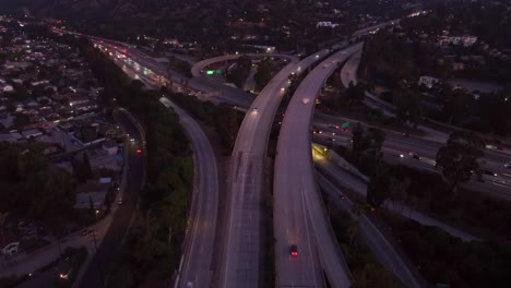 timelapse cars driving on freeway with a spaghetti junction interchange