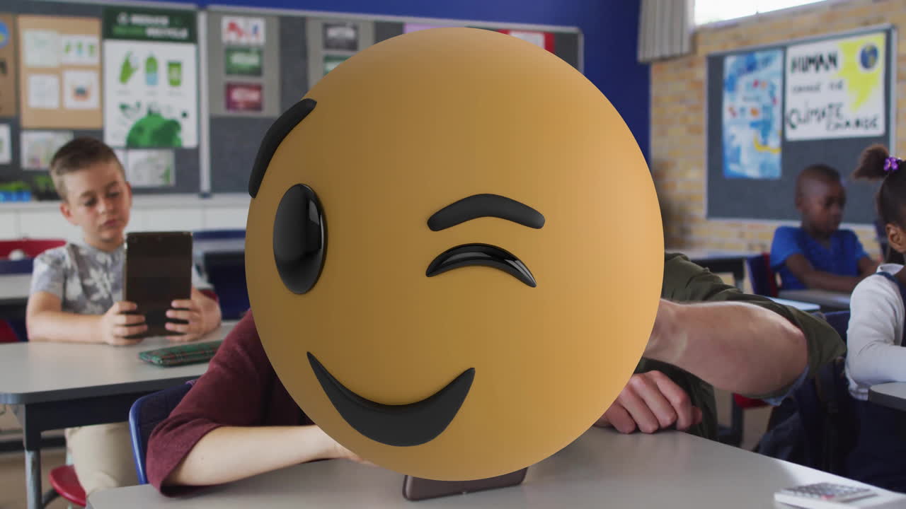 Students using tablets in classroom with large smiley face animation overlay