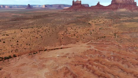 Aerial-tilt-up-reveal-of-Monument-Valley-in-Arizona