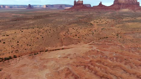 aerial tilt up reveal of monument valley in arizona