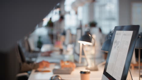 business-people-working-late-using-computer-team-leader-woman-sharing-information-with-colleague-giving-feedback-discussing-solution-for-project-deadline-in-office-at-night