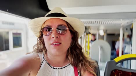 athens market chat: young woman vlogging travel bus