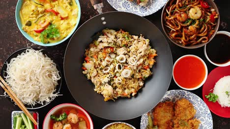 Asian-oriental-food-composition-in-colorful-dishware