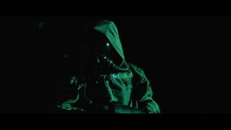 Masked Figure in the Dark