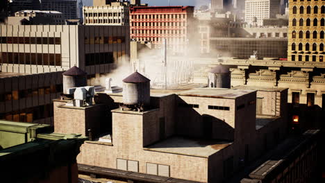 aerial view of a cityscape with water towers on rooftop