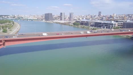 Incredible-orbiting-aerial-4k-shot-of-Gazela-bridge-in-summer-day,-Belgrade