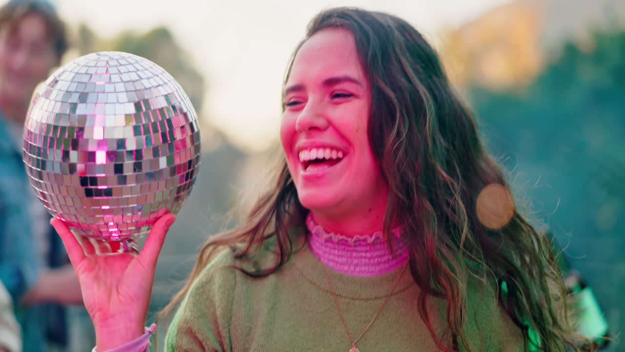 Friends celebrating with a disco ball