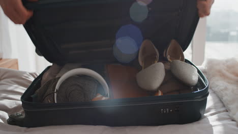 travel woman packing suitcase getting ready for road trip preparing luggage for vacation