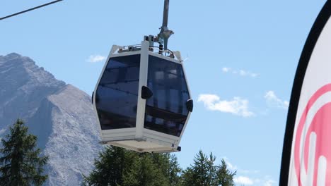 cable car moving through mountainous landscape