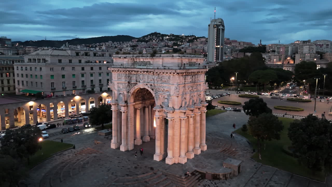 Twilight aerial shot of Arch of Victory on Piazza della Vittoria in Genoa