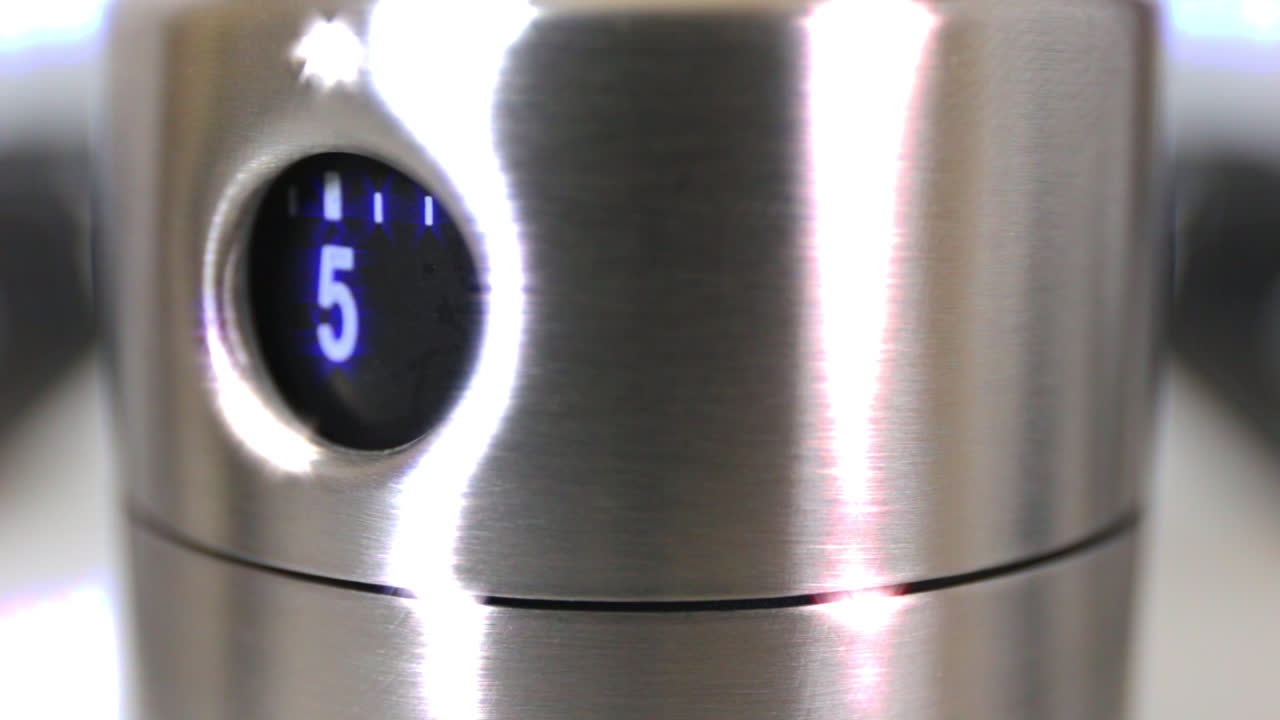 lapso de tiempo del temporizador de huevo deslumbrado de metal