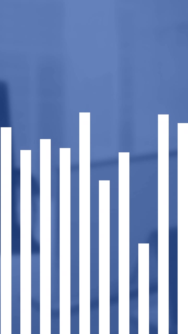 Animazione di grafici a barre su sedia vuota e computer su scrivania in ufficio.