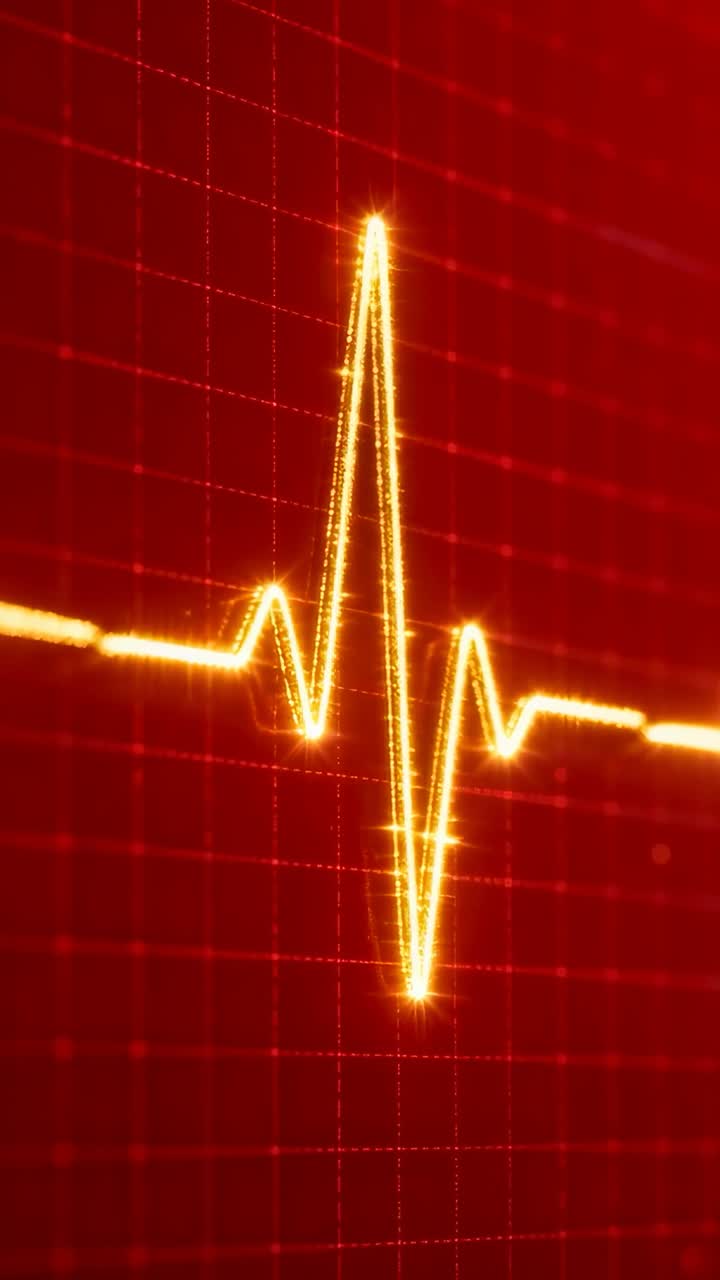 Video verticale: traccia ECG dorata pulsante che lampeggia causando un picco sulla griglia rossa con scintille che mostrano il battito