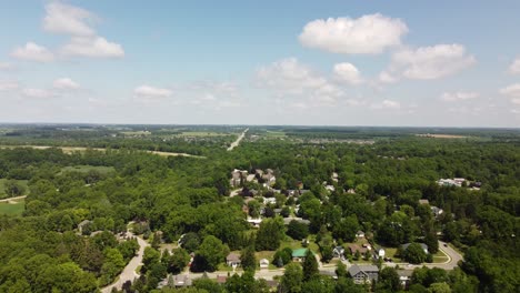 large detached houses within dense forest in ontario canada