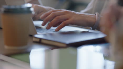 businessman hands using tablet computer viewing project on screen browsing corporate documents online in office boardroom meeting close up stylus pen