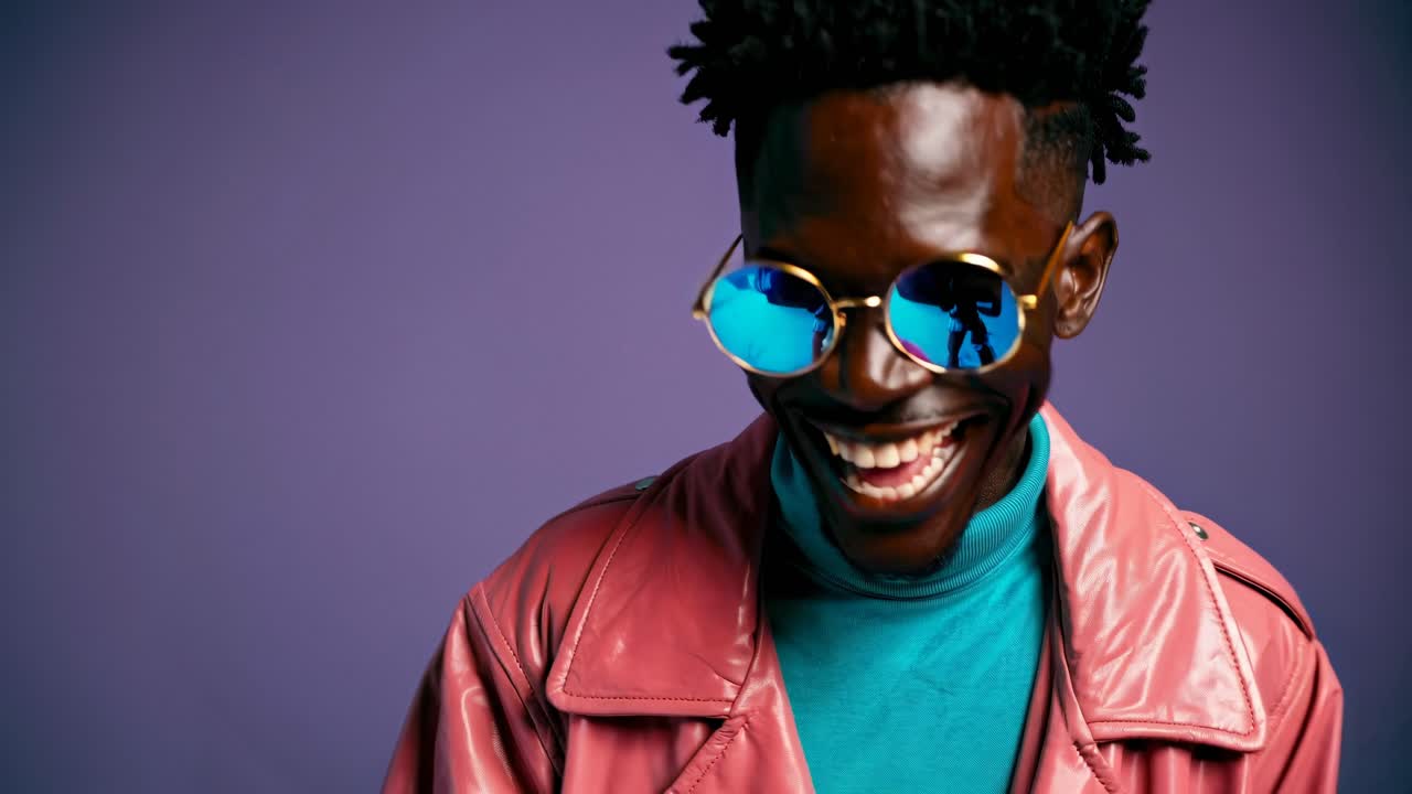 A vibrant video showcasing a stylish individual in bold attire and reflective sunglasses