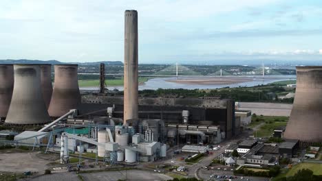 fiddlers ferry power station cooling towers aerial view across rural power plant orbit right