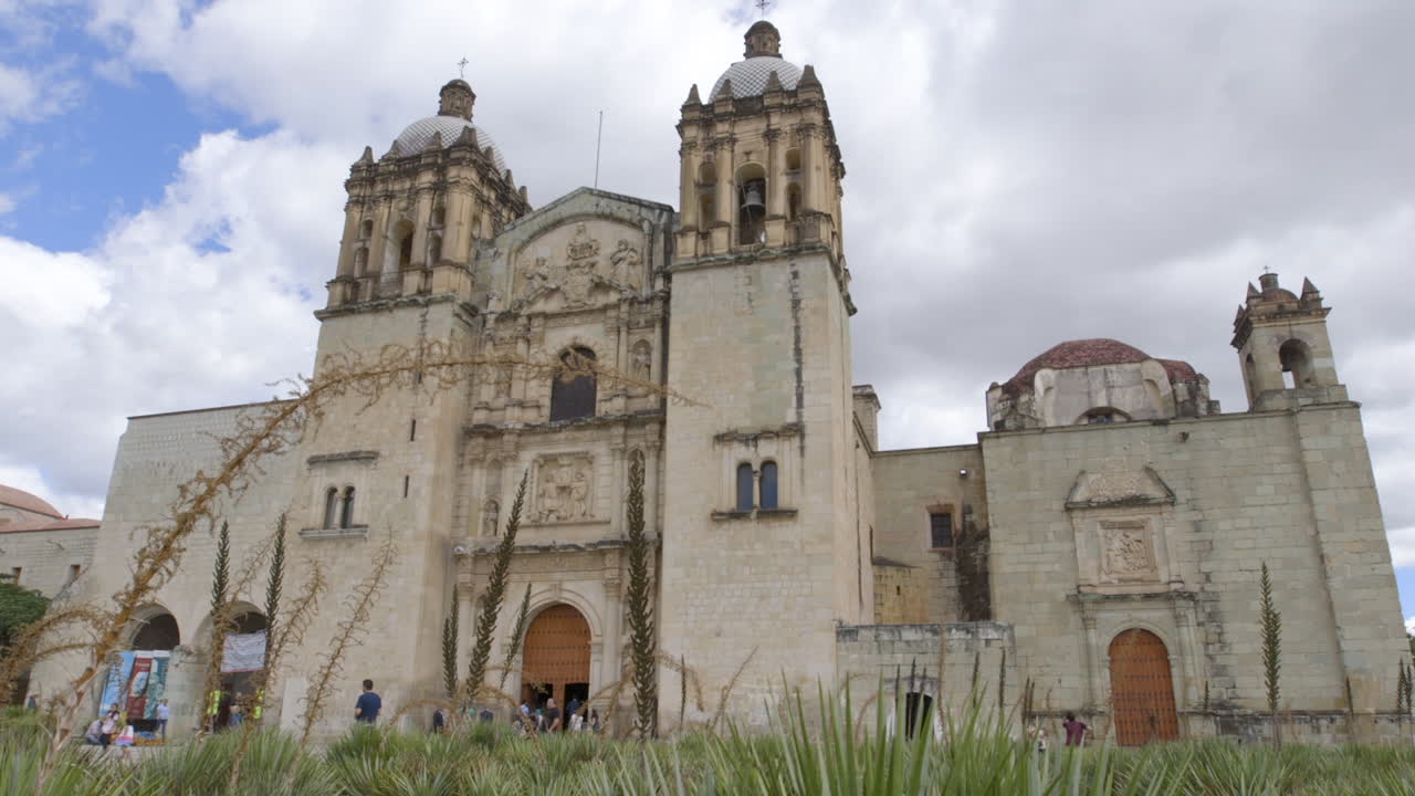 Church of Santo Domingo de Guzmán in Oaxaca Mexico Wide Establishing Shot Grass in Foreground