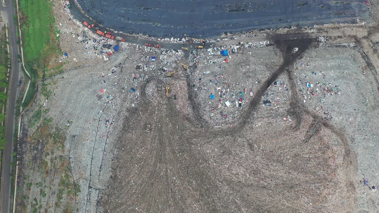 Aerial View of a Landfill with Machinery