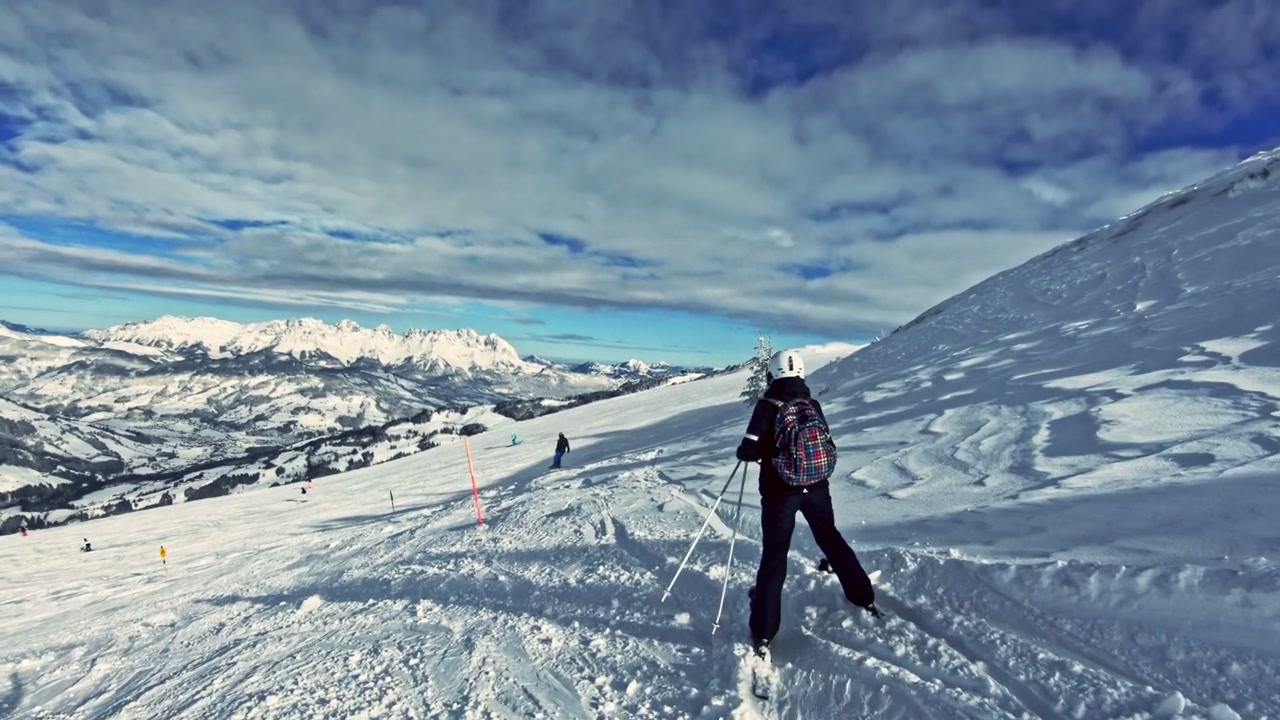 Skiing down the ski trail.